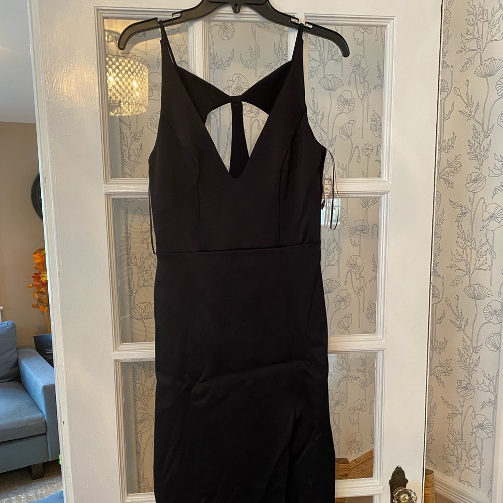 NWT midi cocktail dress by ABS! Size Medium. Black cutout detail and thigh slit